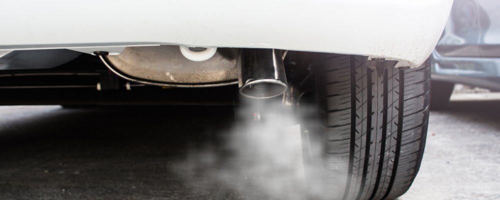Vehicle emissions coming from exhaust pipe
